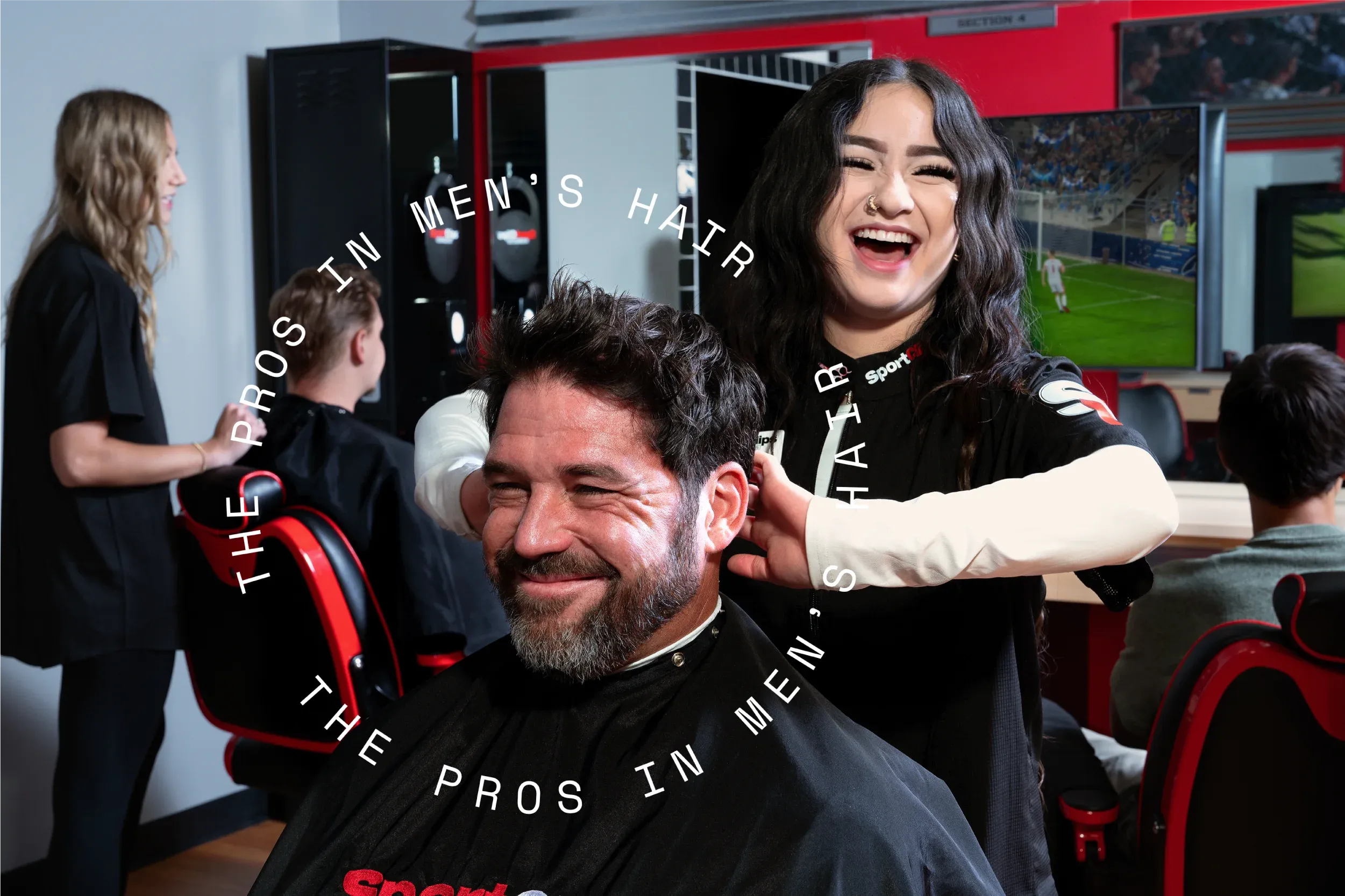 Sport Clips Encino stylists cutting men's hair
